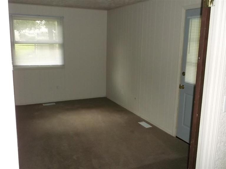 Cape Cod style, driveway, garage in rear