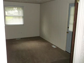 Cape Cod style, driveway, garage in rear