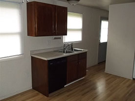 Cape Cod style, driveway, garage in rear