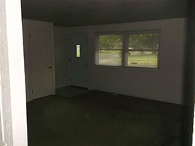 Cape Cod style, driveway, garage in rear