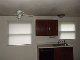 Cape Cod style, driveway, garage in rear