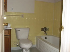 Cape Cod style, driveway, garage in rear