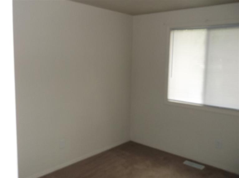 Cape Cod style, driveway, garage in rear