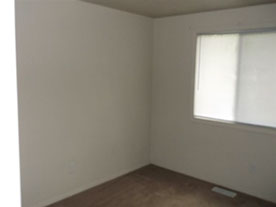 Cape Cod style, driveway, garage in rear