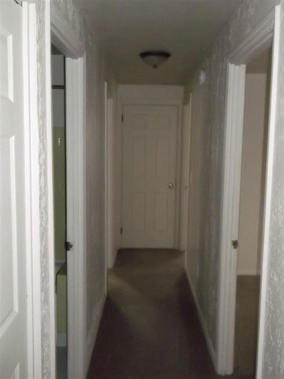 Cape Cod style, driveway, garage in rear