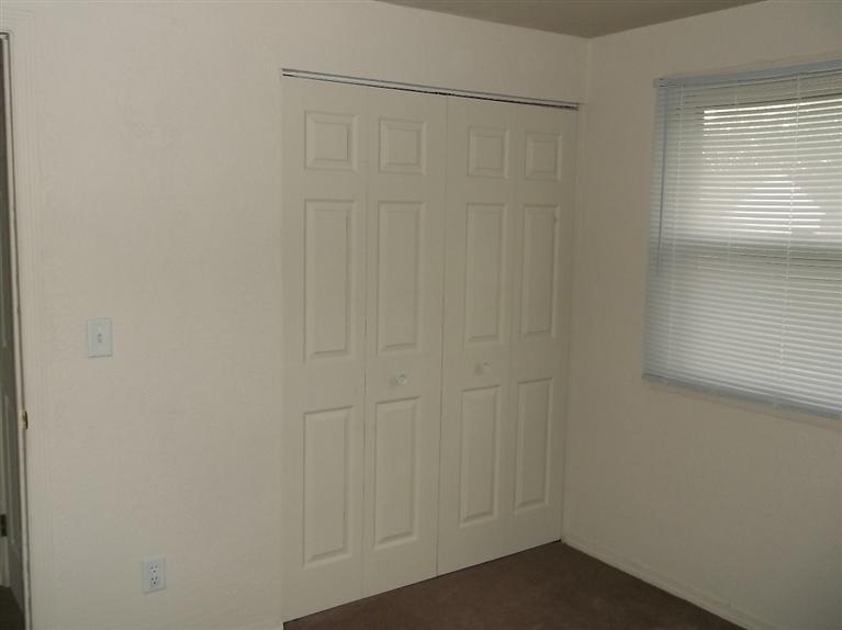 Cape Cod style, driveway, garage in rear