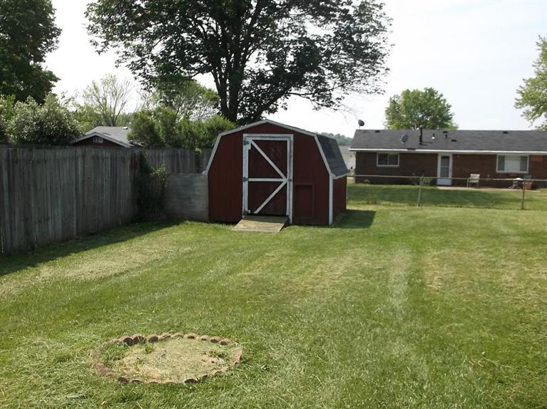 Cape Cod style, driveway, garage in rear