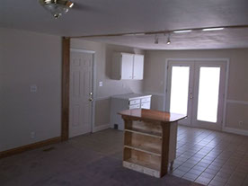 Cape Cod style, driveway, garage in rear