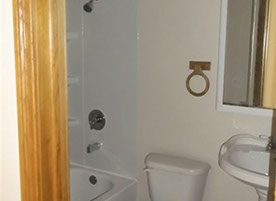 Cape Cod style, driveway, garage in rear