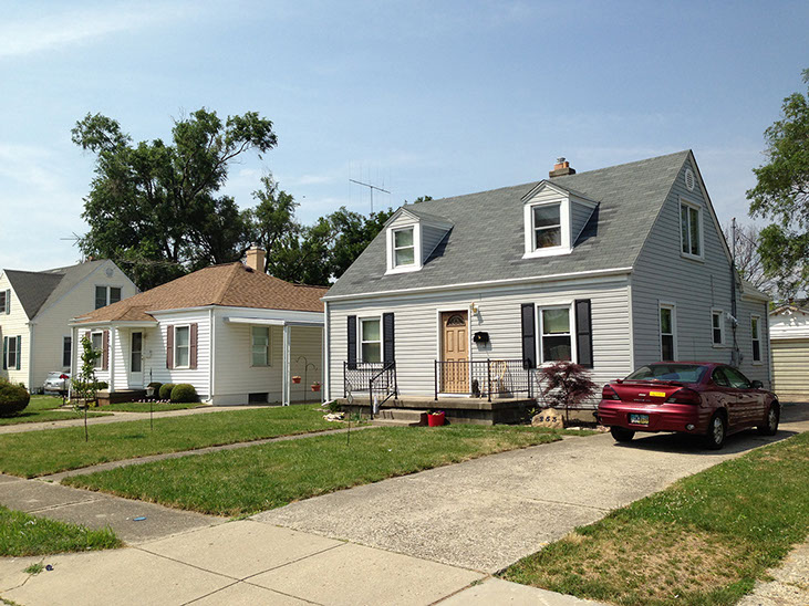 driveway, garage in rear, nice neighborhood