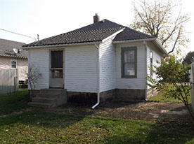 Cape Cod style, driveway, garage in rear