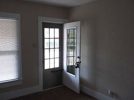 Cape Cod style, driveway, garage in rear