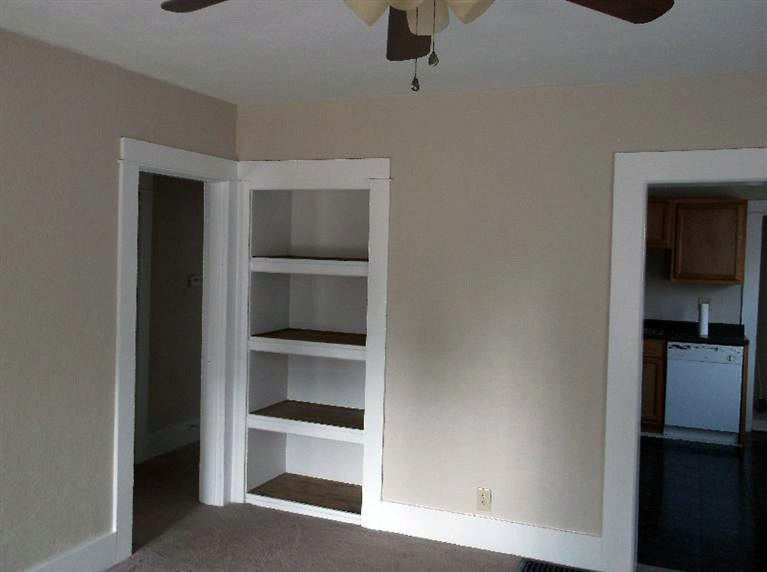 Cape Cod style, driveway, garage in rear