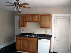 Cape Cod style, driveway, garage in rear