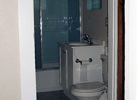 Cape Cod style, driveway, garage in rear