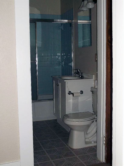 Cape Cod style, driveway, garage in rear