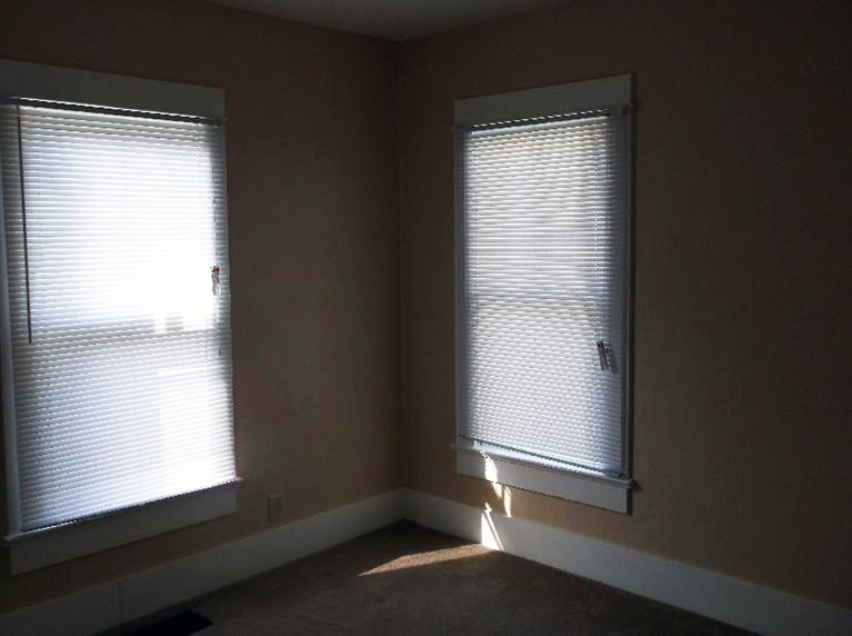 Cape Cod style, driveway, garage in rear